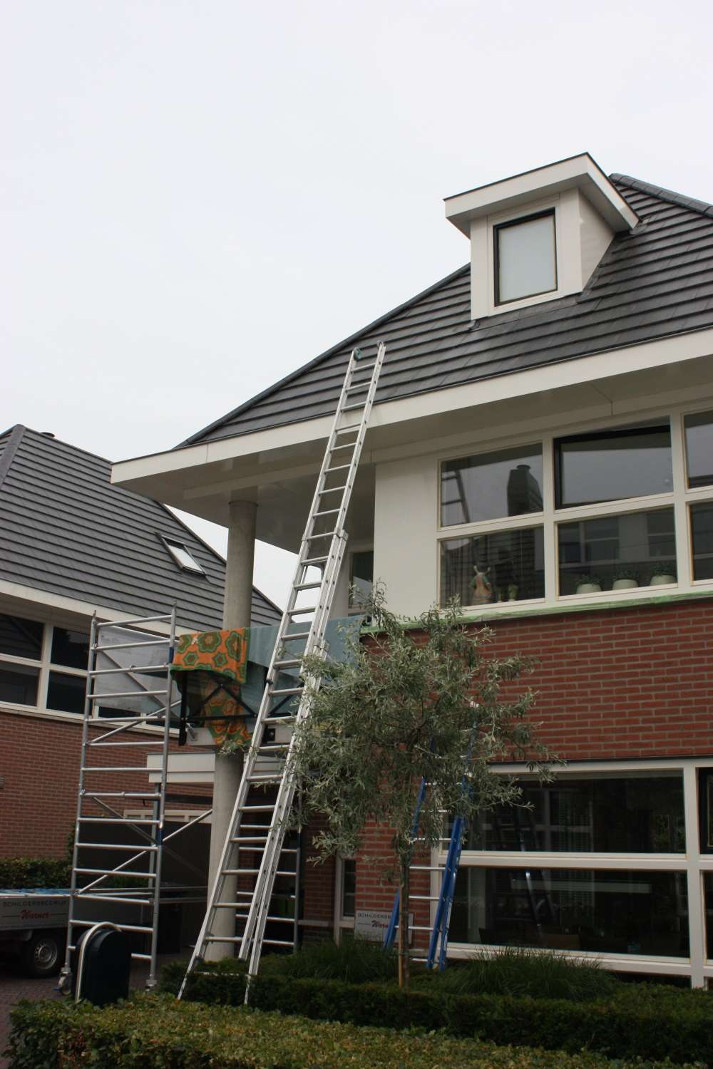 Warner Schilderwerken Logo