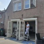 Schilder werk buiten Afbeelding 1