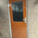 schilderwerk van een schuurdeur met kozijn Afbeelding 1