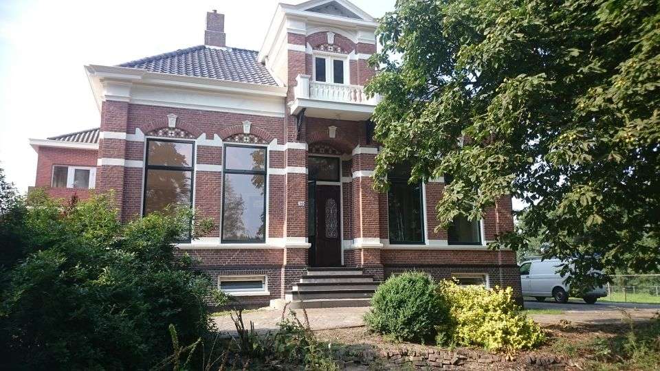 Bliksemschilders Logo