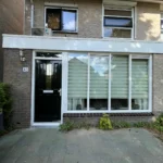 Houtwerk buitenkant huis in Heerhugowaard Afbeelding 1