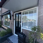 Buitenkant huis houtwerk in ijmuiden Afbeelding 1